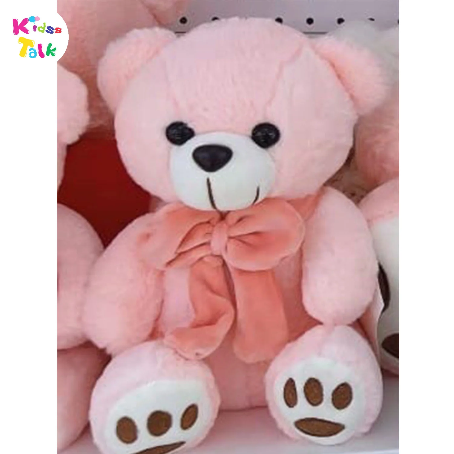 Soft Teddy Sitting With Bow